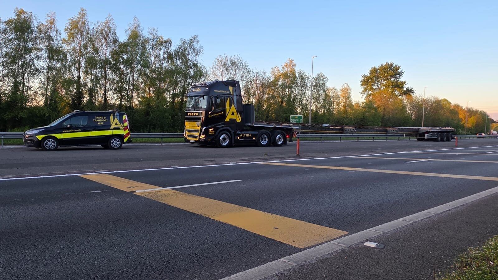 Altida's truck running the 38.5-metre rail on the Broshuis trailer, the in-house escort vehicle alongside on the road