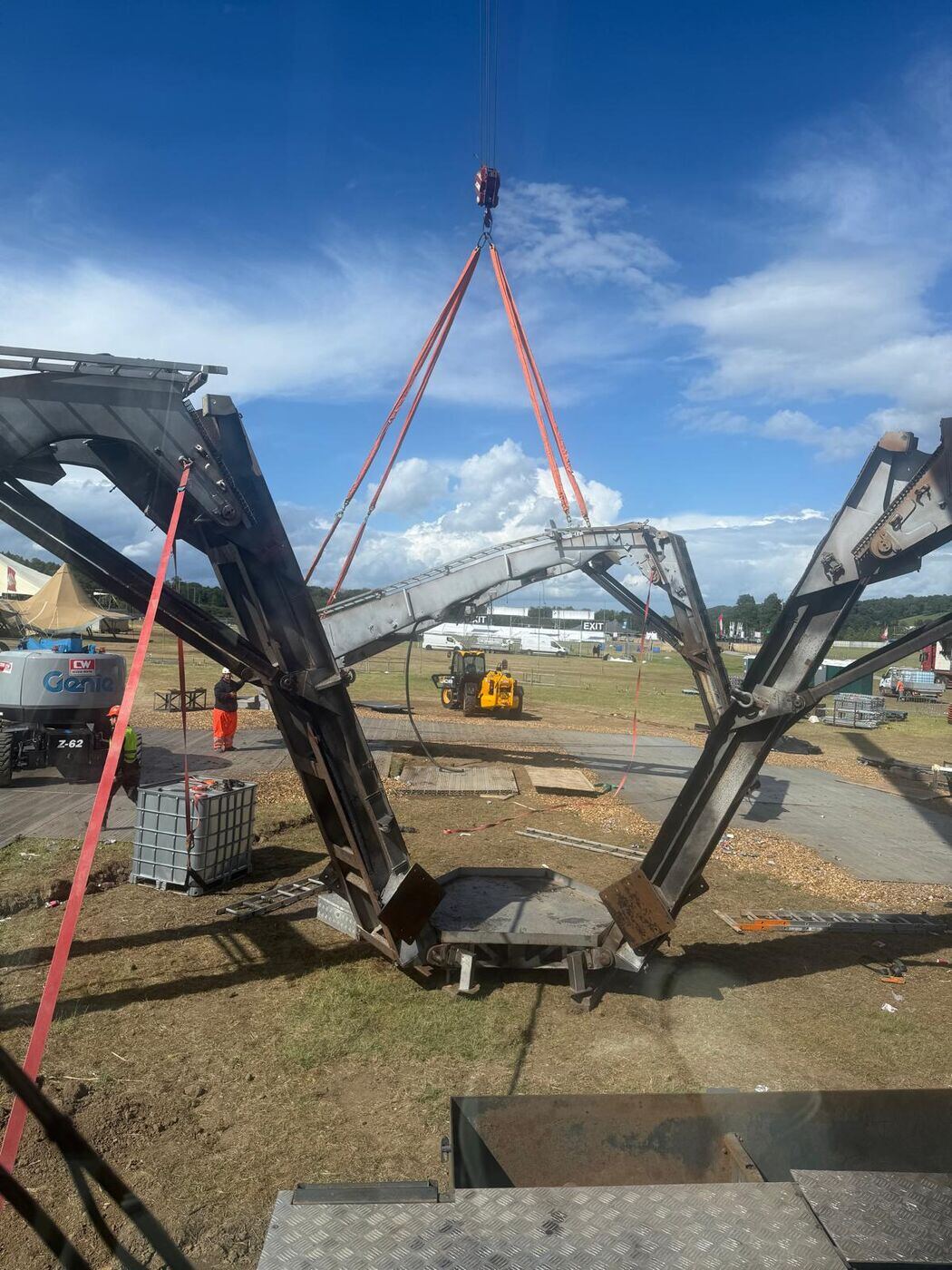Altida's AC 140 dismantling a steel art installation at Forbidden Forest Festival — photo 5 of 7
